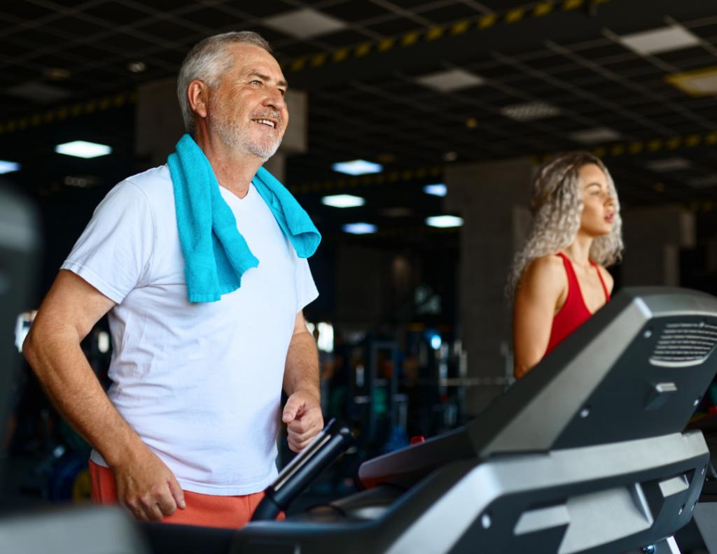 Man and woman walking on treadmill